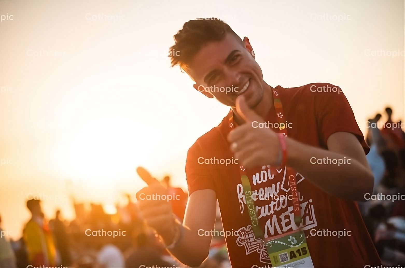 Catholic young man smiling at WYD 2023