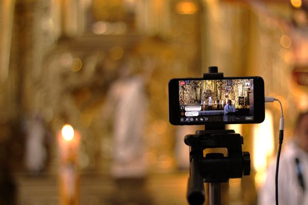 Photo of live mass in church.