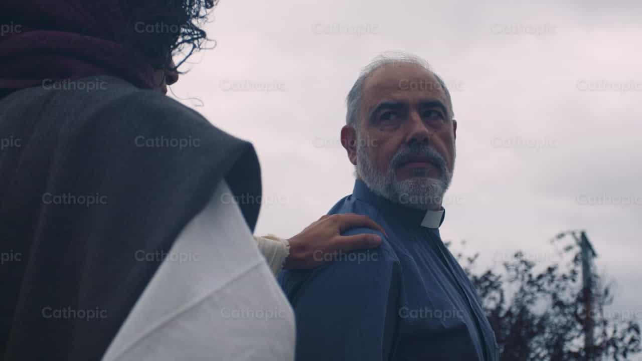 Jesus touches the priest's shoulder - Catholic stock videos - Photo by Almures Studio