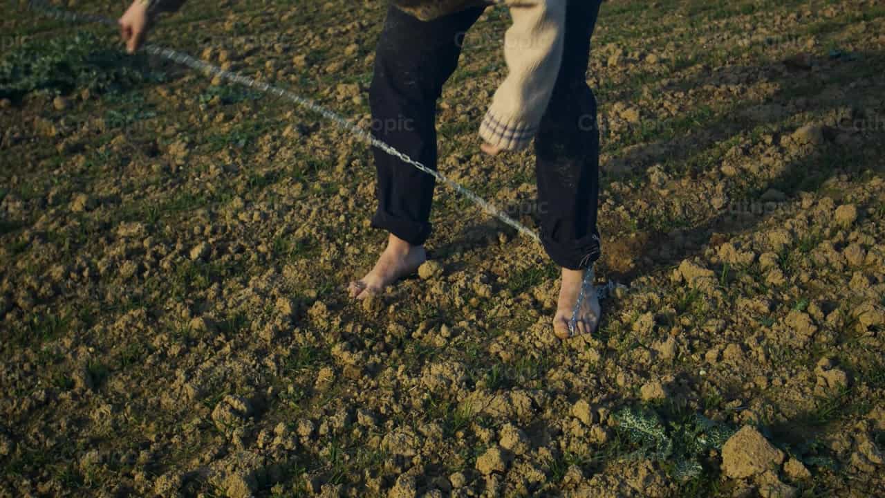 Young man frees himself from the chains of sin - Catholic stock videos - Photo by Almures Studio