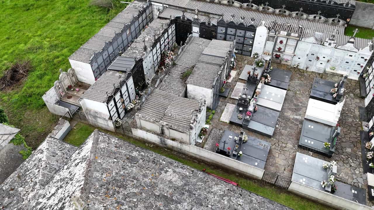 Rural cemetery next to a chapel - Catholic stock videos - Photo by Yandry Fernández Perdomo