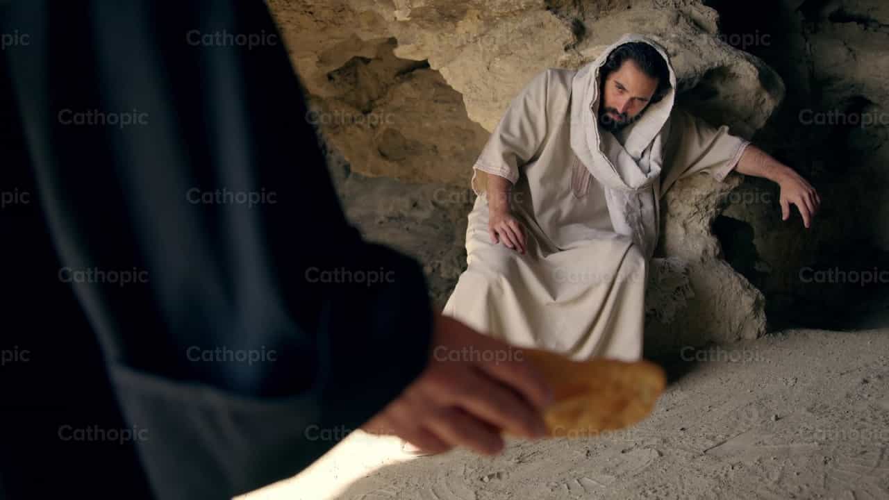 El diablo tienta a Jesús con pan en el desierto - Banco de vídeos católicos