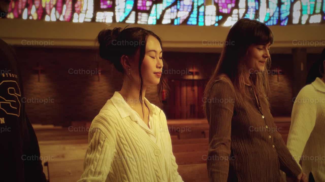 Multicultural youth prayer - Catholic stock videos - Photo by Almures Studio