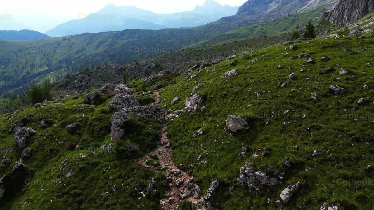 Reaching the top of the Dolomitas mountain - Catholic stock videos - Photo by Santiago de la Hoz