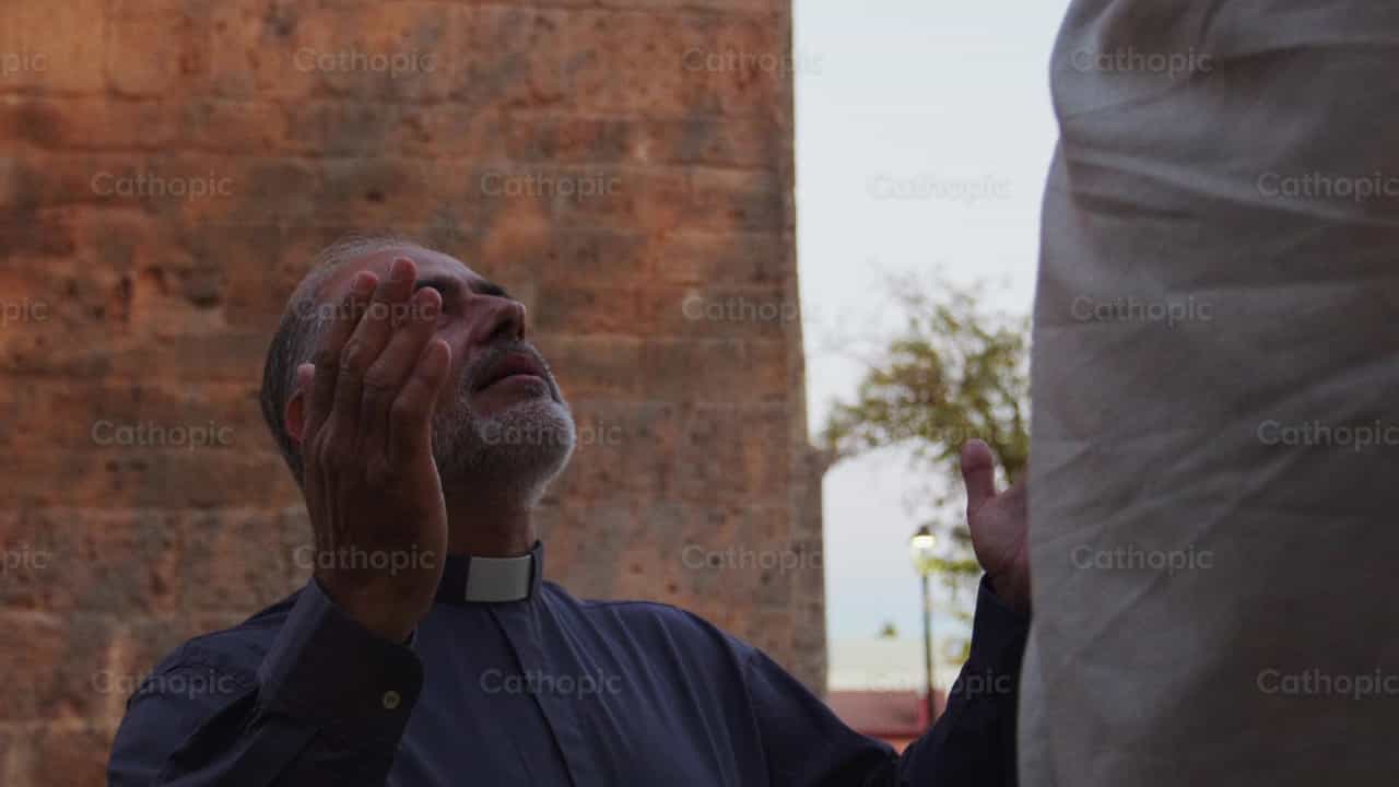 Priest worships Jesus - Catholic stock videos - Photo by Almures Studio
