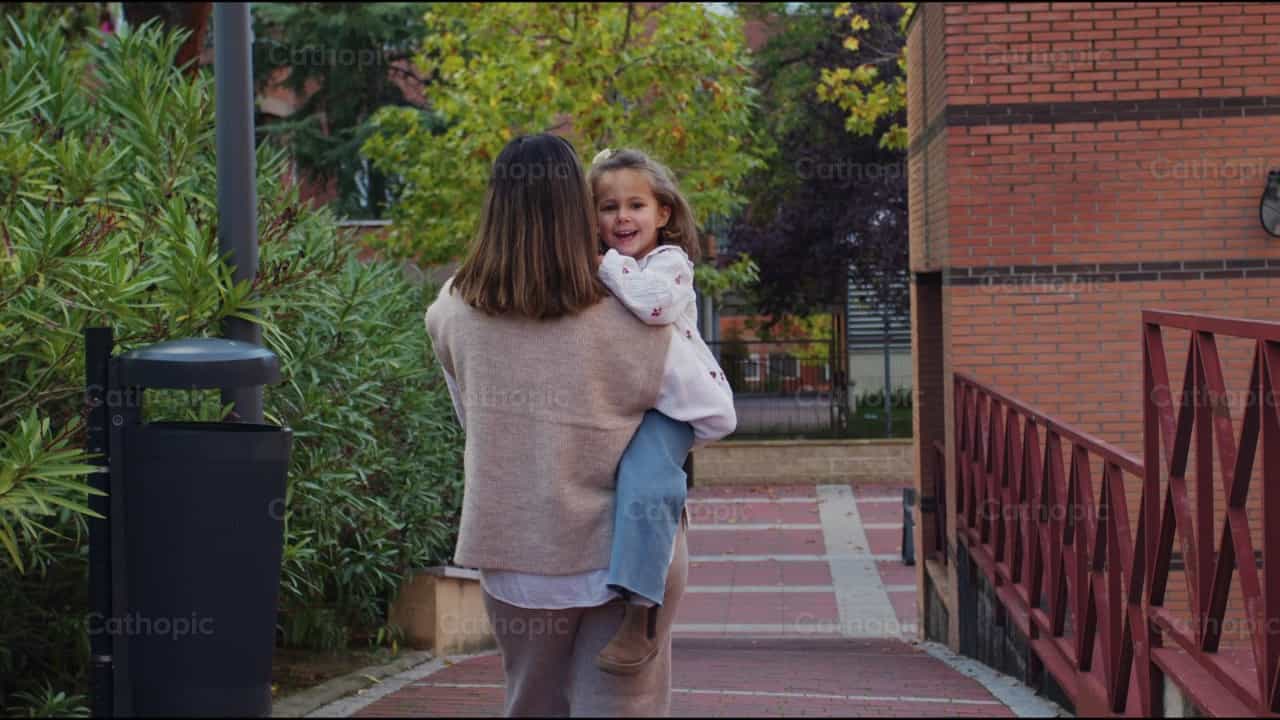 Mother and daughter walk in the park - Catholic stock videos - Photo by Almures Studio