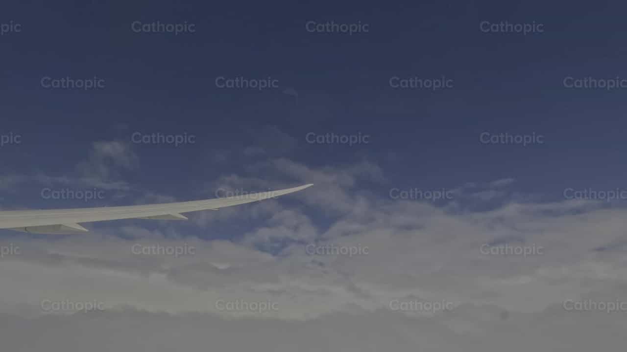 Vuelo en avion - Banco de vídeos católicos - Fotografía por Frames Cristianos
