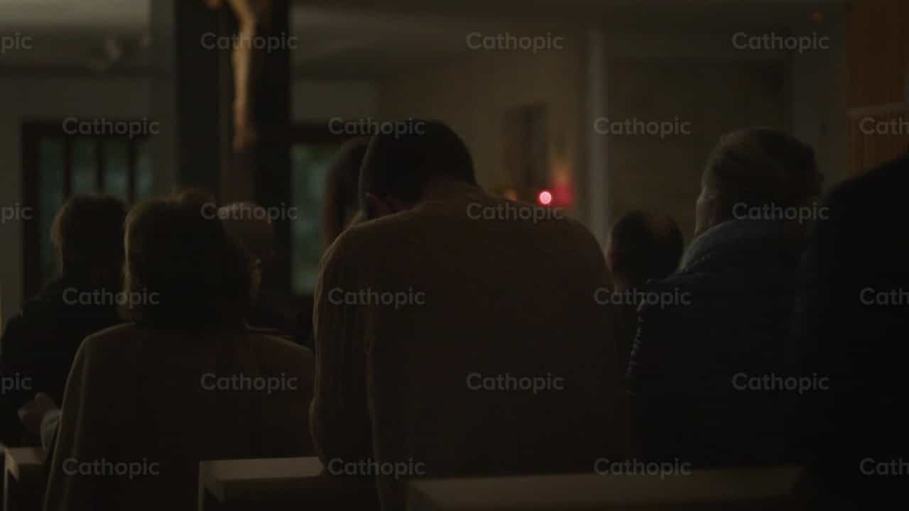 Young man worshiping - Catholic stock videos
