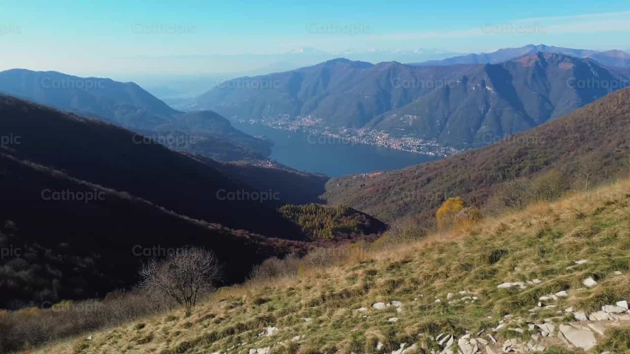Man walking to the top of the mountain - Catholic stock videos - Photo by Frames Cristianos