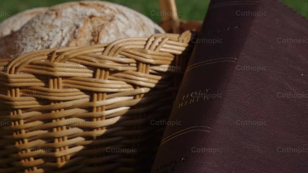 Bible and bread - Catholic stock videos - Photo by Santiago de la Hoz