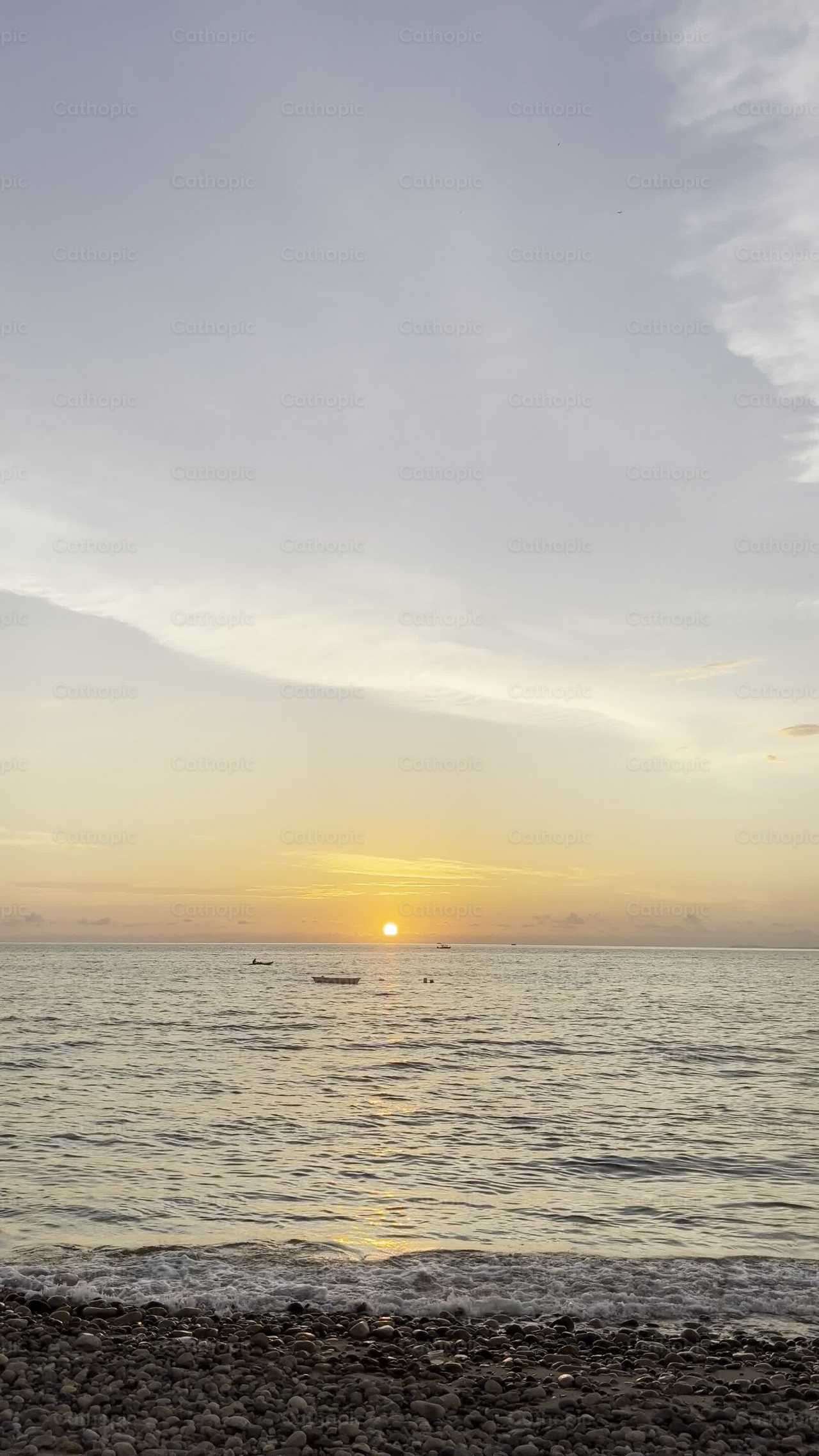 Atardecer en la playa - Banco de vídeos católicos - Fotografía por Frames Cristianos
