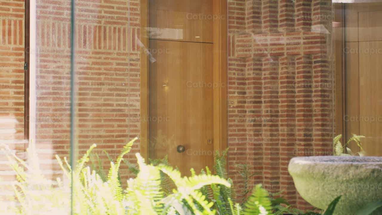 Priest entering the parish office - Catholic stock videos - Photo by Almures Studio