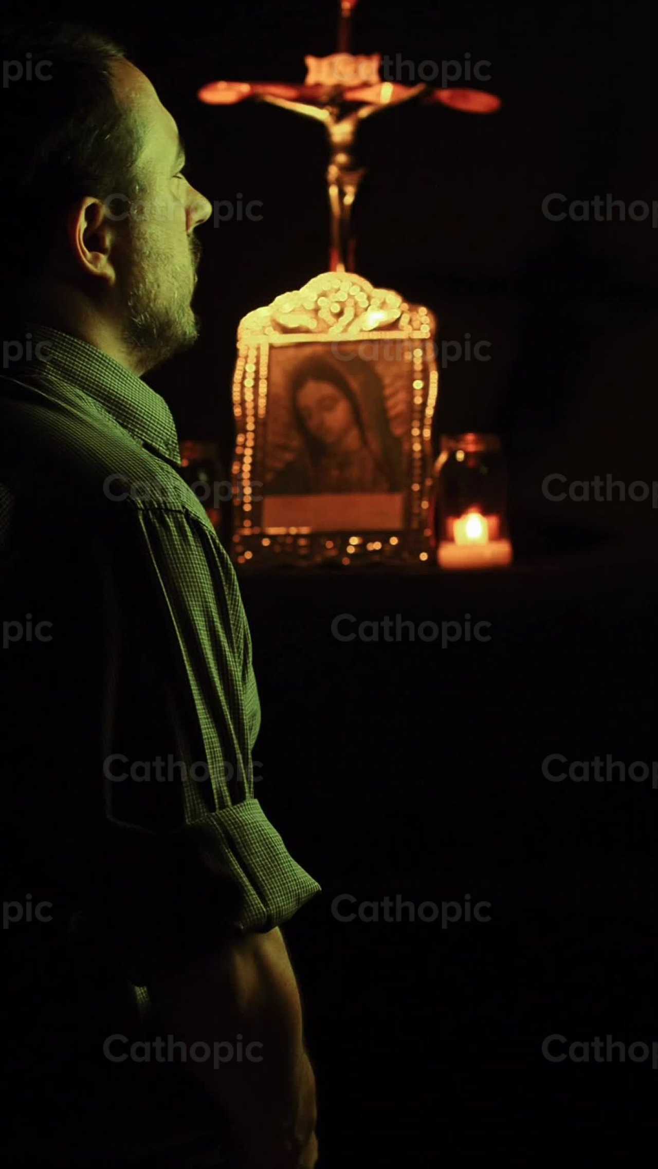 Man praying the rosary on his knees - Catholic stock videos