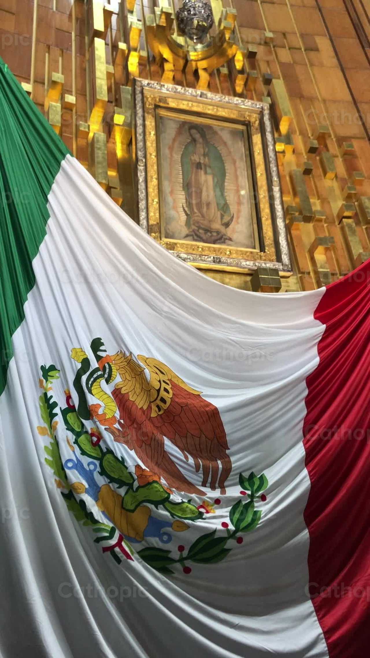 Our Lady of Guadalupe, Original Tilma with flag - Catholic stock videos - Photo by Lizardi Saucedo