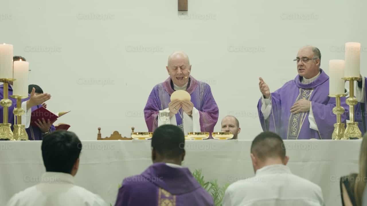Consecration of the Body of Christ at Mass - Catholic stock videos - Photo by Carlos Gaviria