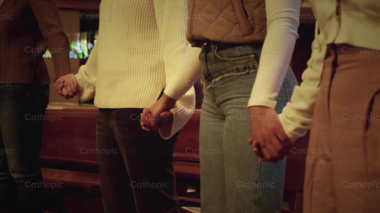 Multicultural hand prayer - Catholic stock videos - Photo by Almures Studio