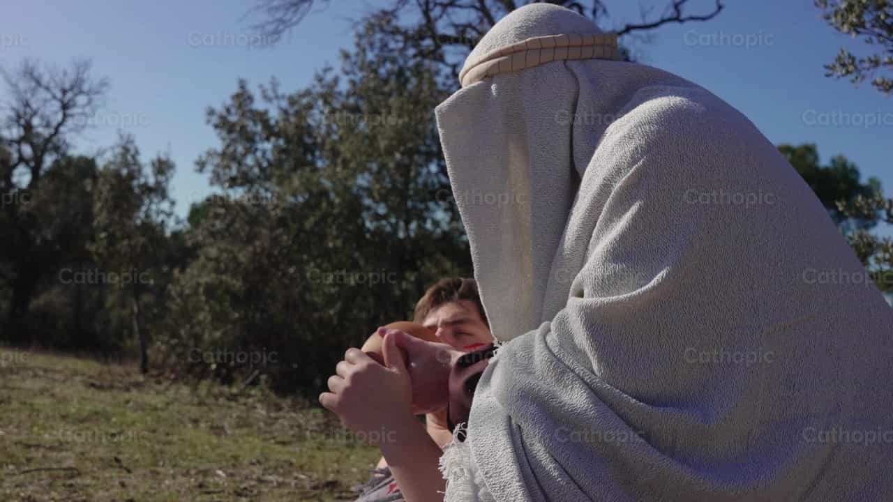 De barmhartige Samaritaan geeft te drinken - Katholieke stockvideo's - Foto door Santiago de la Hoz