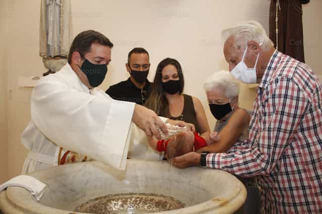 Baby christening - Catholic stock images