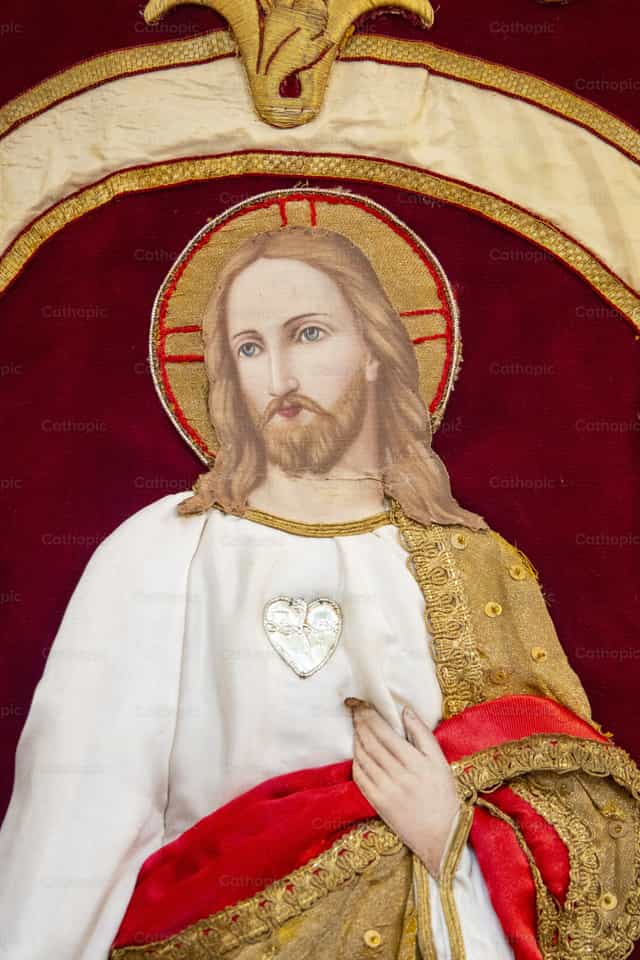 Geborduurde banier met het Heilig Hart van Jezus - Katholieke stockfoto's