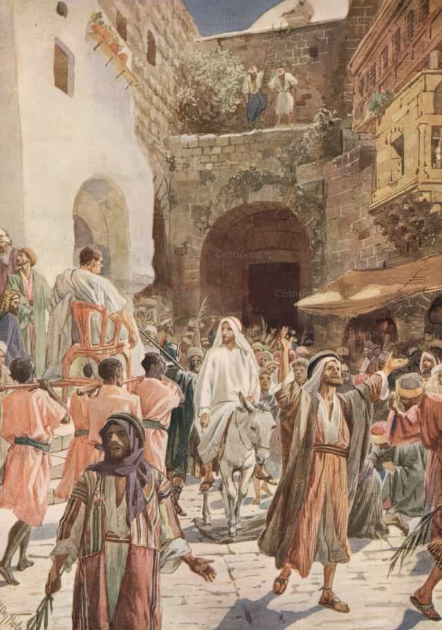 Jesus, montado no filhote de uma jumenta, entra em Jerusalém - Imagens católicas de stock