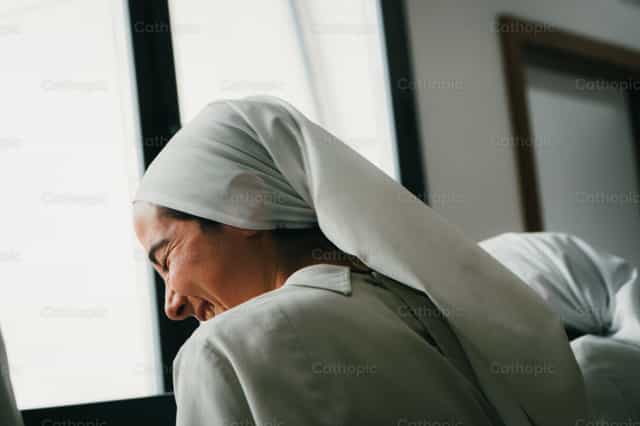 Cheerful Augustinian Nun - Catholic stock images - Photo by Almures Studio