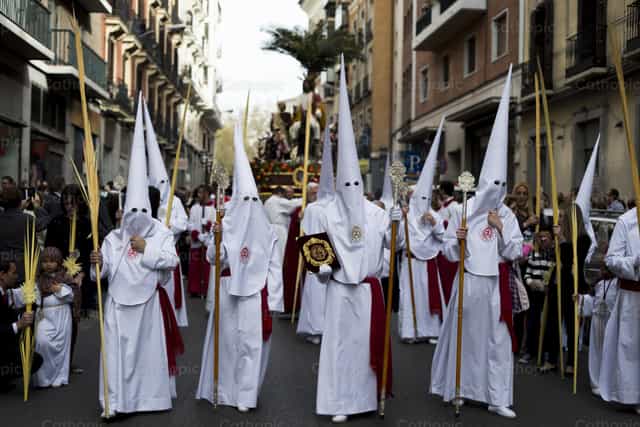 Nazarenes in procession on Palm Sunday - Catholic stock images - Photo by Álvaro García