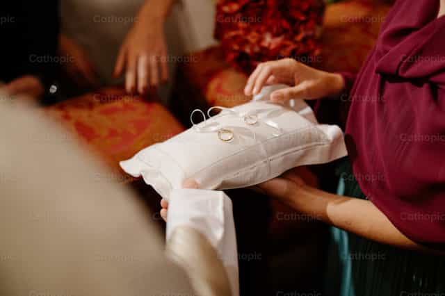 The wedding rings - Catholic stock images - Photo by Matt Kolf