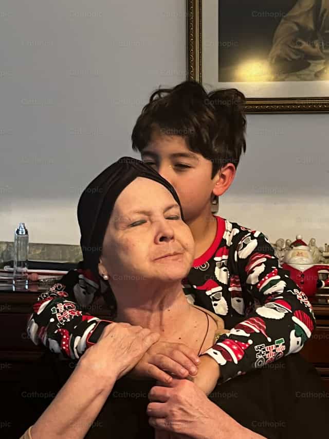 The love between a grandma and her grandson - Catholic stock images