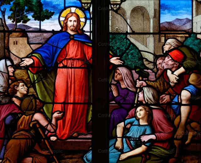 Jesus Christ healing the sick and wounded - Catholic stock images - Photo by Joan Sutter