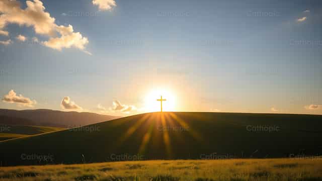 Naka-backlight na krus na nakatayo sa isang burol sa paglubog ng araw, na may mga sinag ng araw na dumaraan dito - Mga Catholic stock image - Larawan ni Antonio Gravante