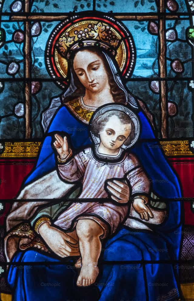 María con el Niño Jesús en brazos - Banco de imágenes católicas - Fotografía por Joan Sutter