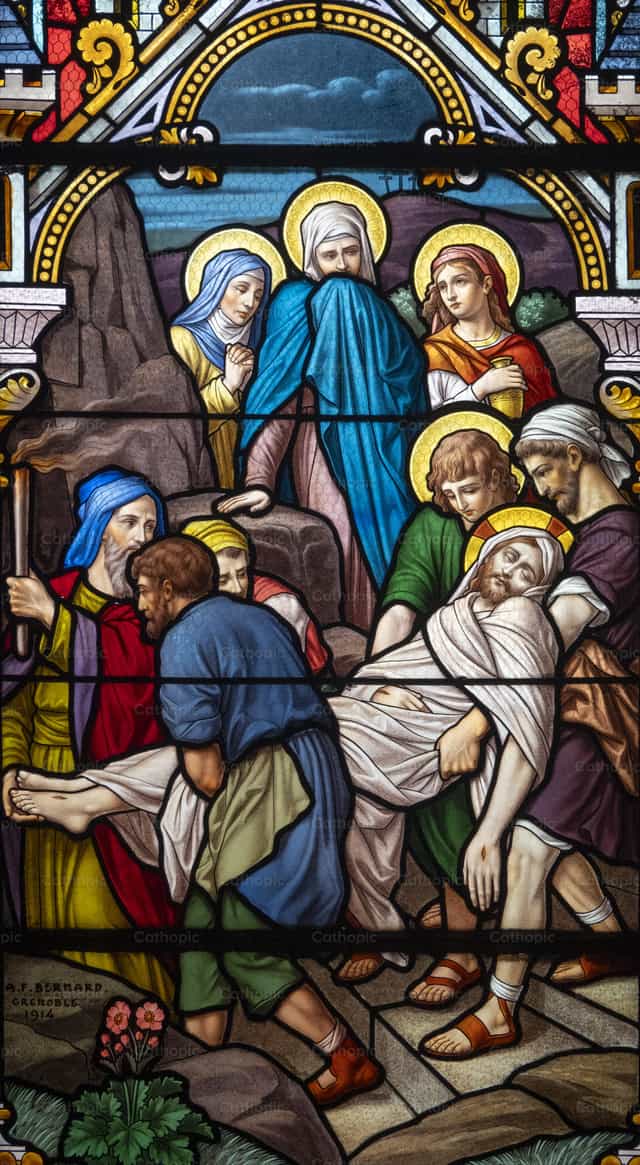 Le corps de Jésus est déposé au tombeau - Images catholiques de stock - Photo de Joan Sutter