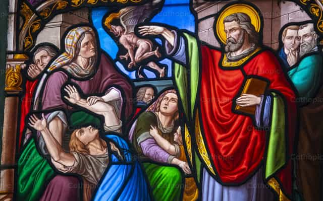 Saint Peter exorcising a woman - Catholic stock images - Photo by Joan Sutter