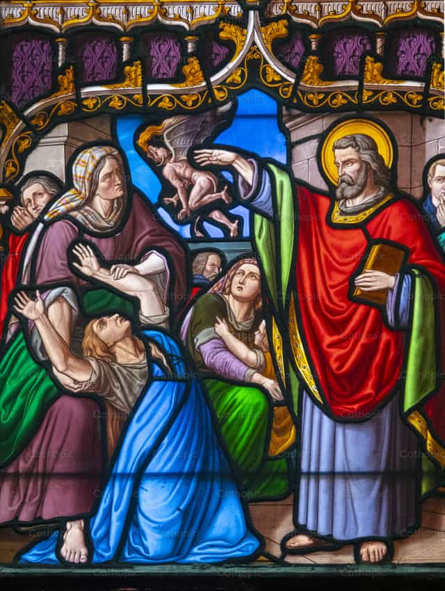 Saint Peter exorcising a woman - Catholic stock images - Photo by Joan Sutter