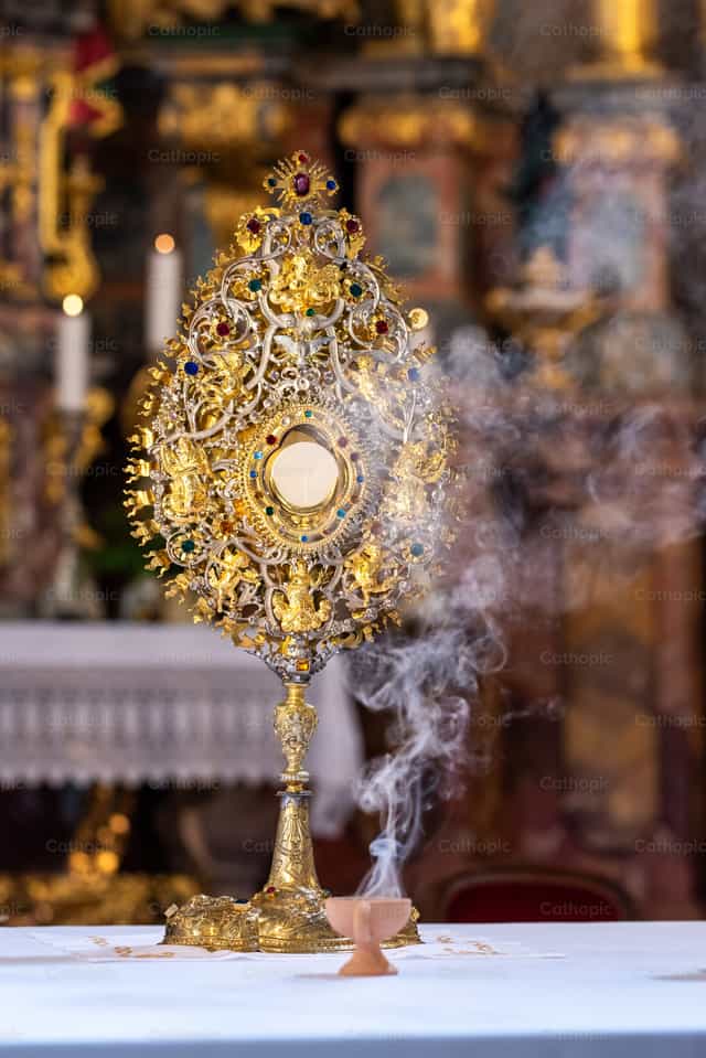 Most Holy Sacrament with incense - Catholic stock images - Photo by Metod Perme