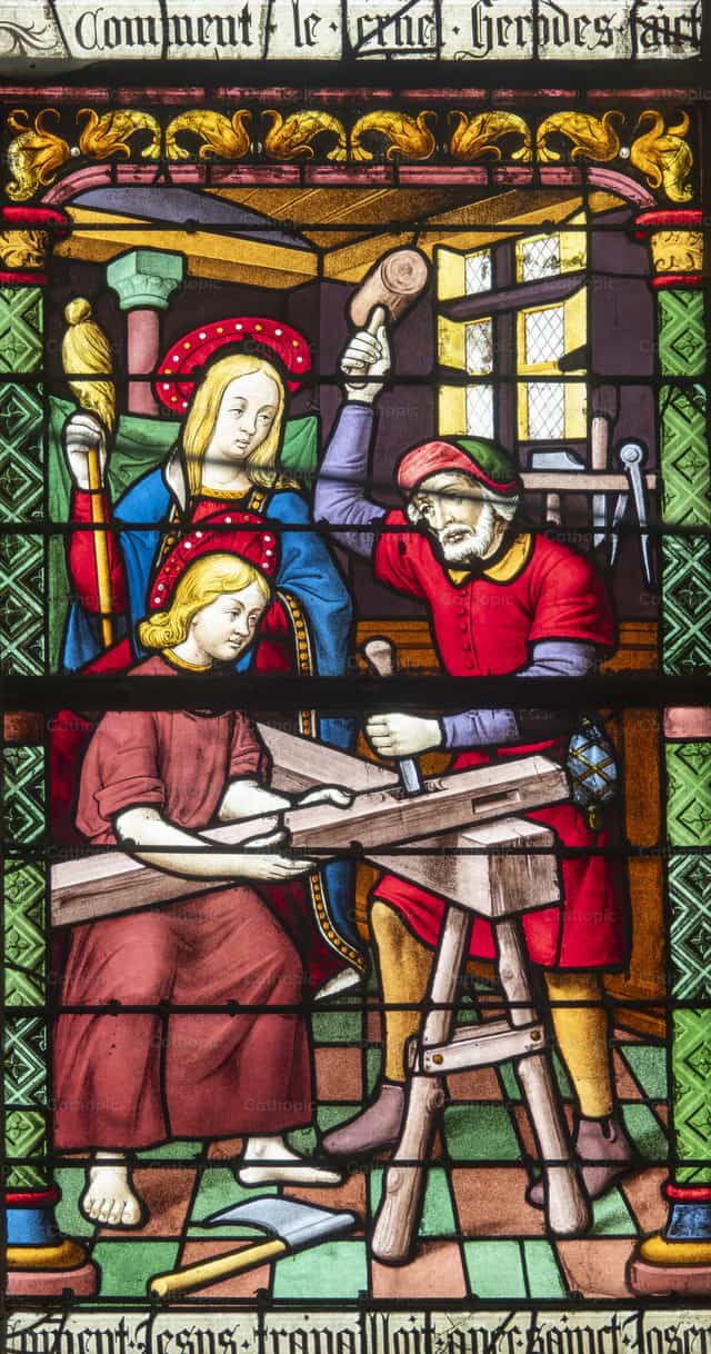 Sagrada familia en el taller de José - Banco de imágenes católicas - Fotografía por Joan Sutter