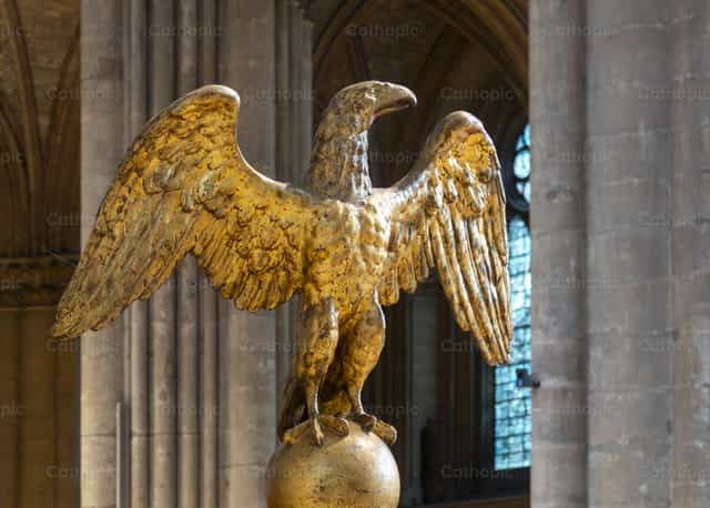 Golden eagle statue in a cathedral - Catholic stock images - Photo by Joan Sutter