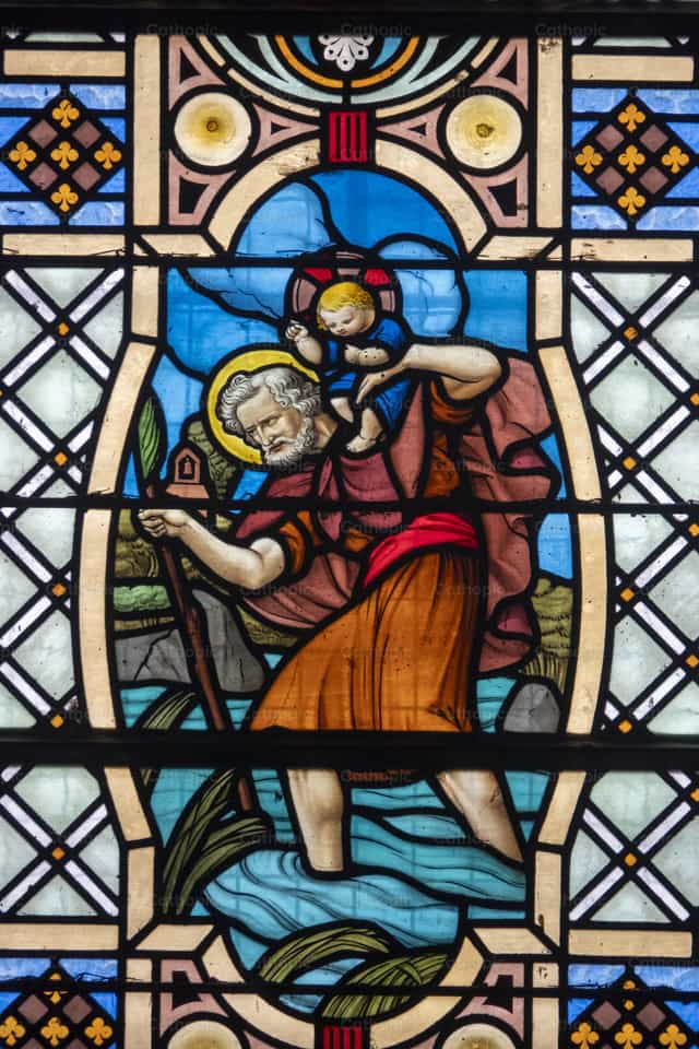San Cristóbal llevando a Jesús sobre sus hombros - Banco de imágenes católicas - Fotografía por Joan Sutter