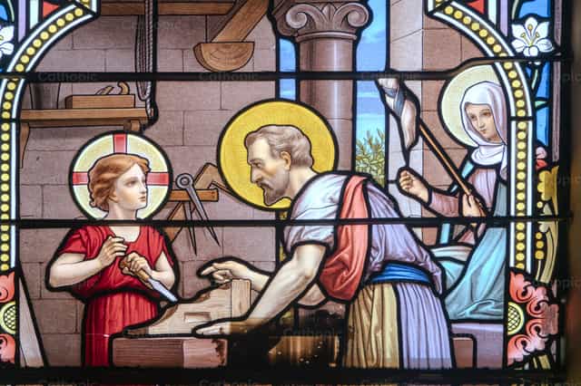 La Sagrada Familia en el taller de José, el carpintero - Banco de imágenes católicas - Fotografía por Joan Sutter