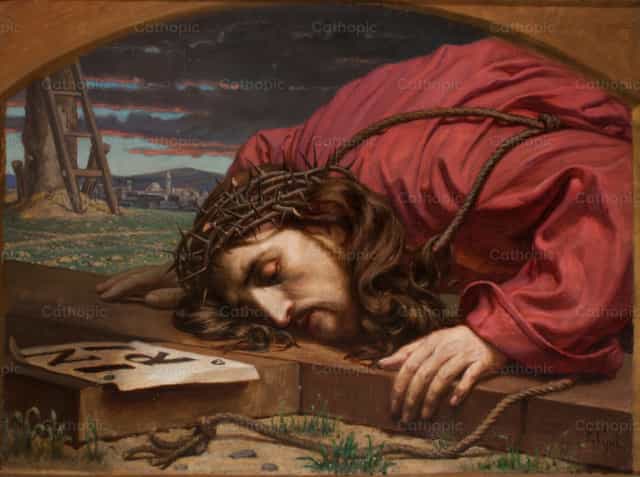 Le Christ embrassant la croix - Images catholiques de stock