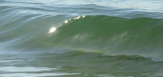Suaves olas con reflejos de sol mar caribe - Banco de imágenes católicas - Fotografía por Sandra Otalora
