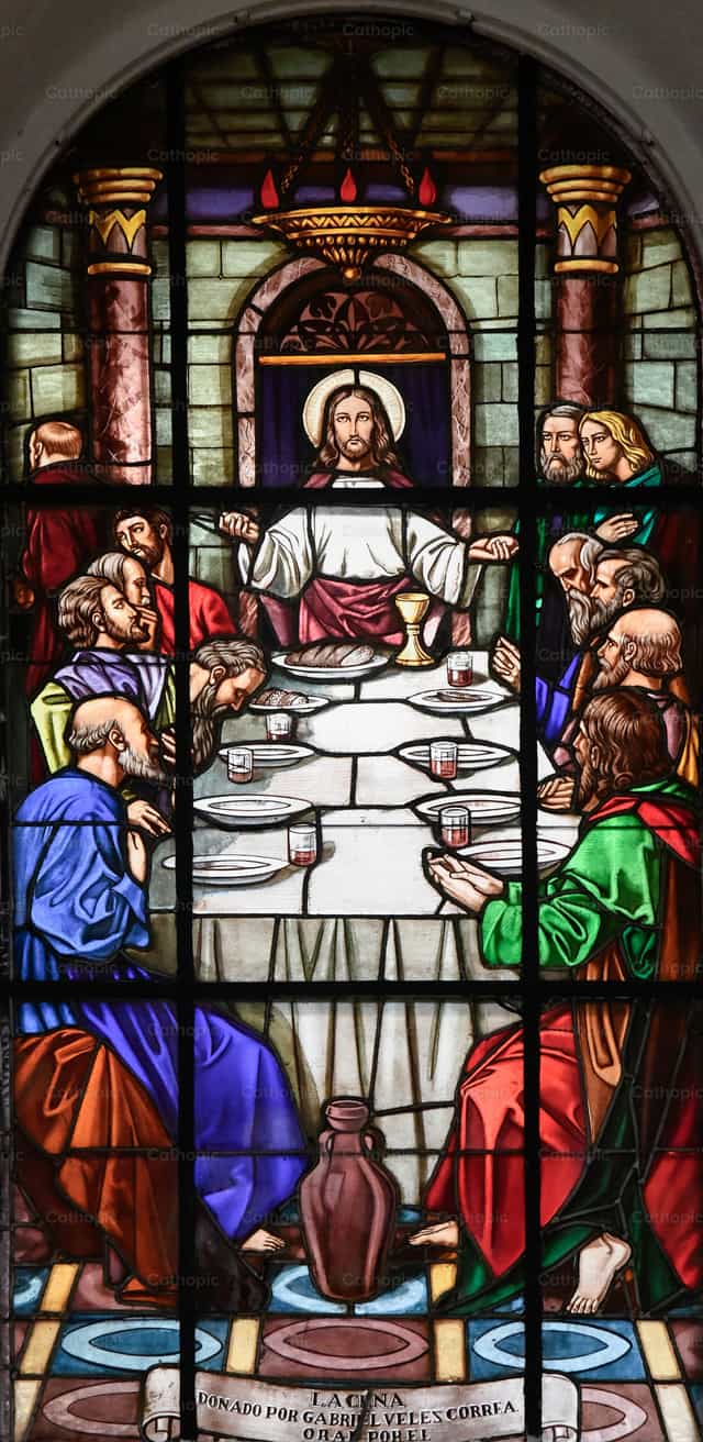 Last Supper stained glass inside Catholic church - Catholic stock images