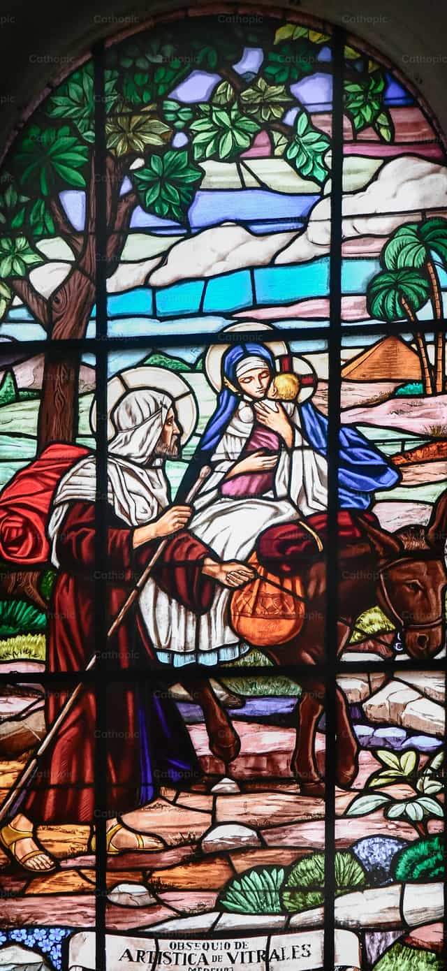 A Fuga para o Egito em uma janela de vitral religioso - Imagens católicas de stock - Foto de Carolina BR