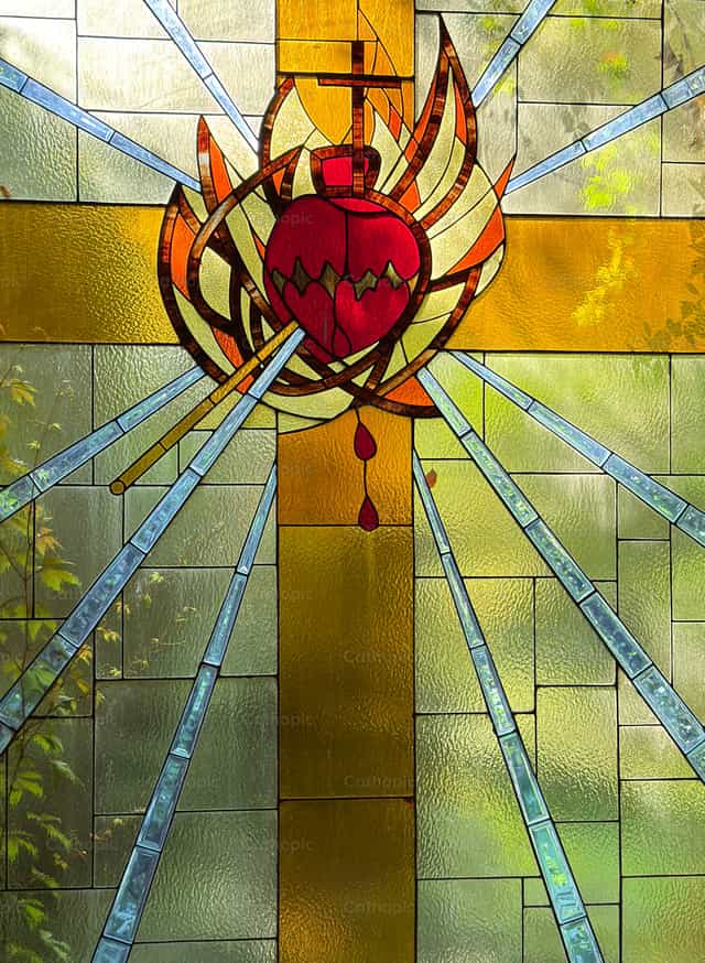 Sagrado corazón y cruz - Banco de imágenes católicas - Fotografía por Pablo Meza