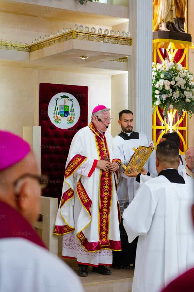 Bishop presiding over the Solemn Mass - Catholic stock images - Photo by Miguel White