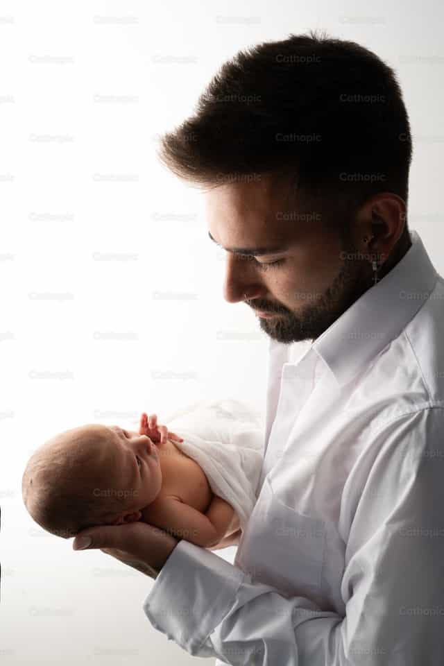Father and Newborn Son - Catholic stock images - Photo by Clina CG