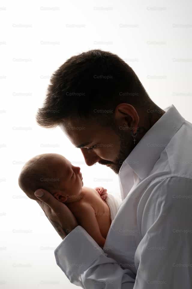 Father and Newborn Son - Catholic stock images - Photo by Clina CG