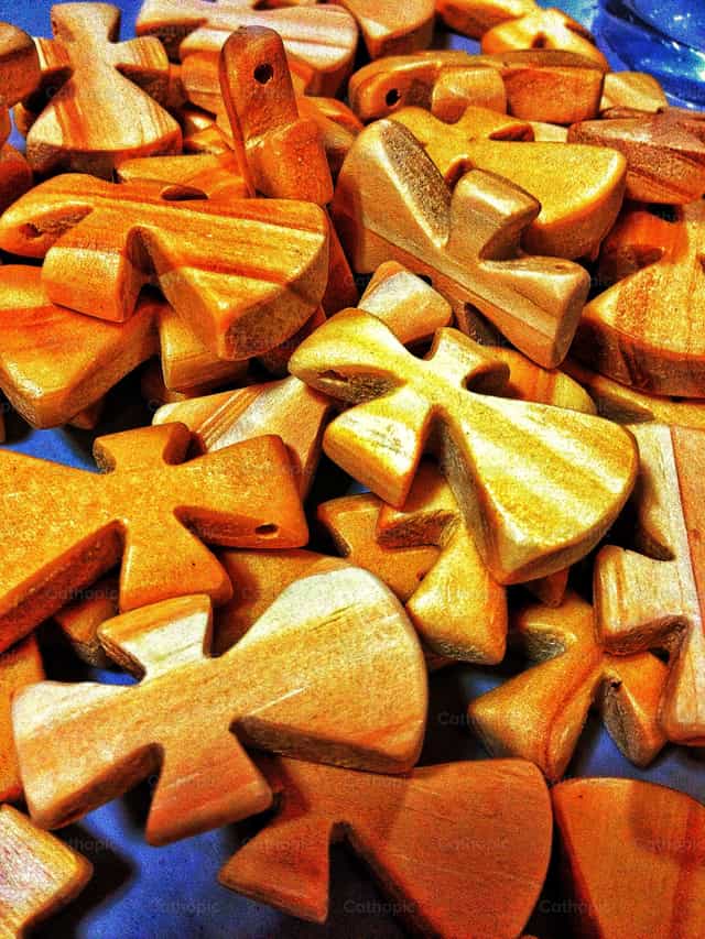 La fede sono semi che insieme formano la Croce - Immagini stock cattoliche