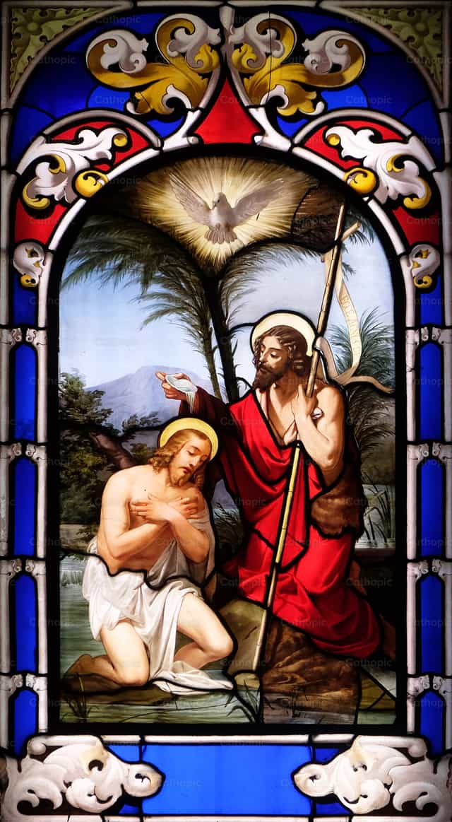 Stained-glass window depicting the baptism of Jesus Christ - Catholic stock images - Photo by Zvonimir Atletić