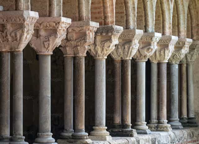Row of Carved Columns in Ancient Cloister - Catholic stock images - Photo by Joan Sutter